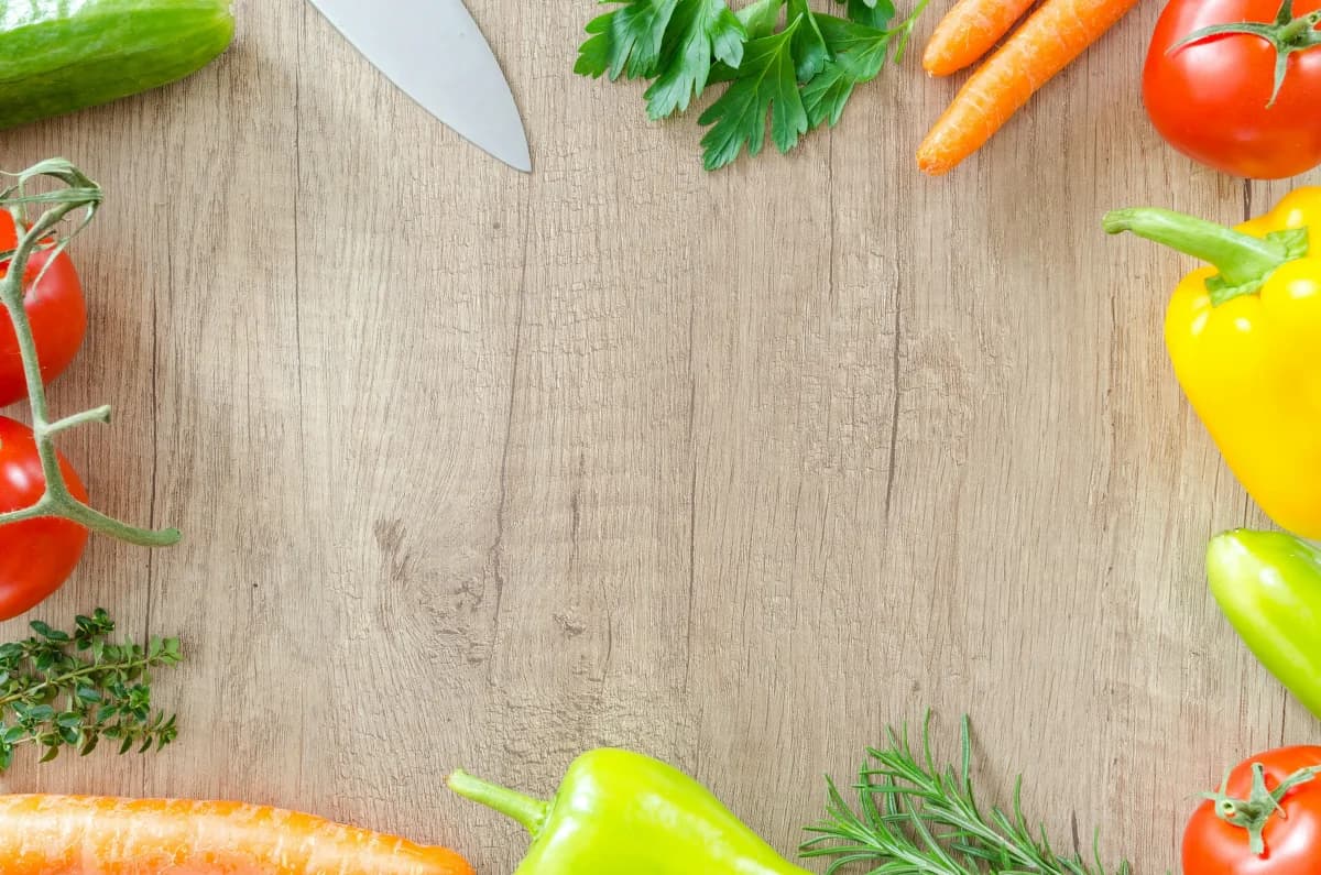 Beautiful kitchen herb garden with organized beds of basil, rosemary, thyme, and parsley